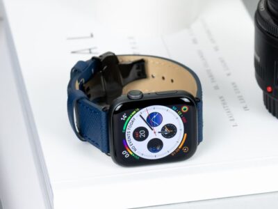 Apple Watch with blue leather band.