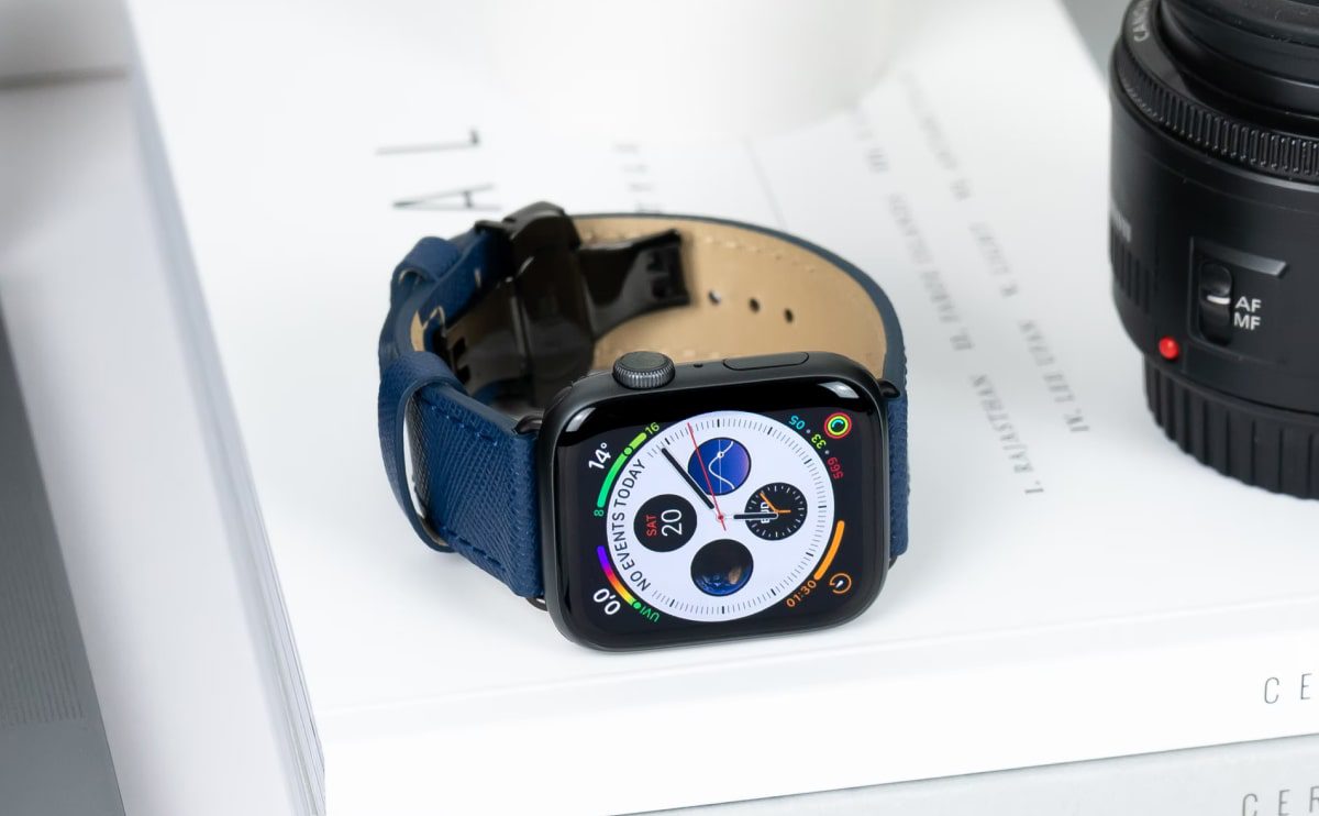 Apple Watch with blue leather band.