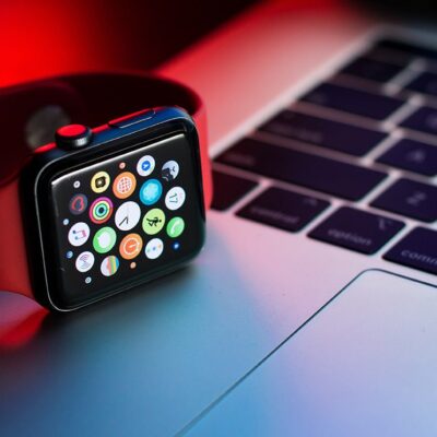 Apple Watch on laptop keyboard.