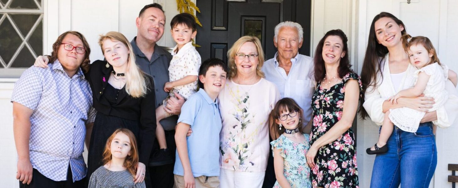 Large family portrait at home.